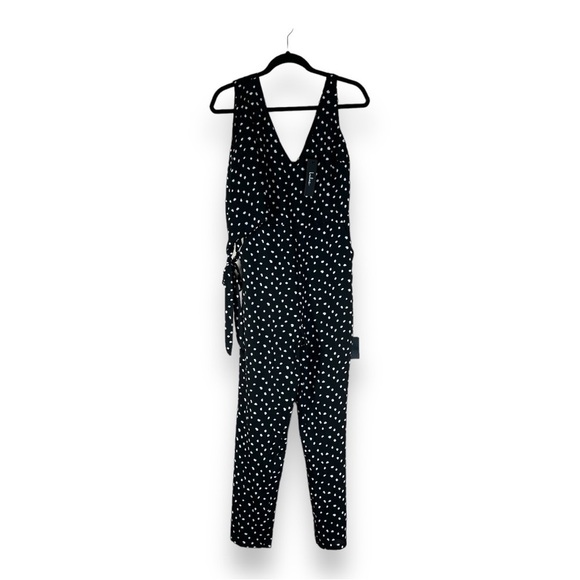 NEW LULUS XS JUMPSUIT BLACK WHITE POLKA DOT V NECK ASYMMETRICAL SLEEVE RETRO - Picture 1 of 15